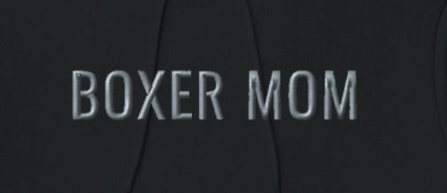 BOXER MOM - Classic Unisex Pullover Hoodie With Discreet Embroidered Text.